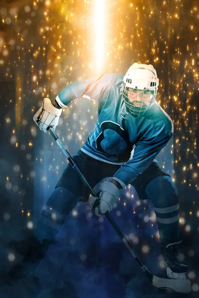 Ice hockey player. Download high resolution photo for sports betting advertisement. Icehockey athlete in the helmet and gloves on stadium with stick. Action shot. Sport concept. Sports wallpaper