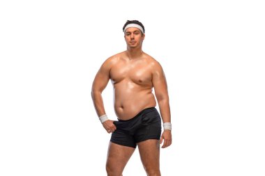 Çok şişman bir adam kendini kremayla doyurur. Obezite ve yeme bozukluğu. Sosyal ağlarda diyet ve fitness reklamları kavramı