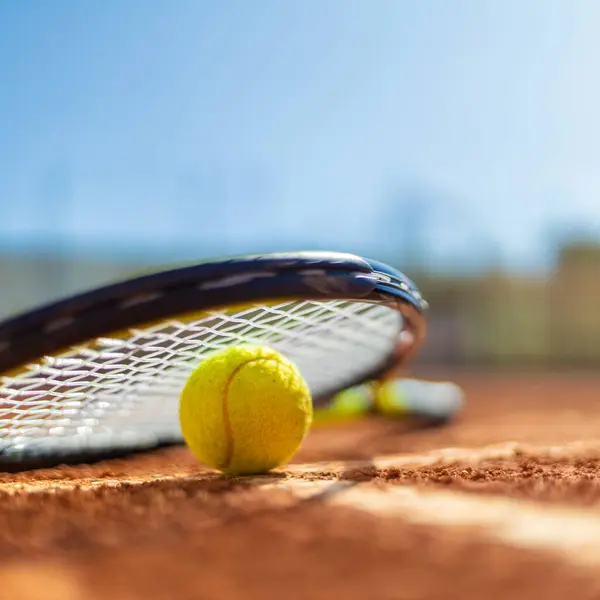 Tennis rackets. Sport court and balls. Download a high quality photo with paddle for the design of a sports app or social media advertisement