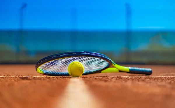 Tennis rackets. Sport court and balls. Download a high quality photo with paddle for the design of a sports app or social media advertisement