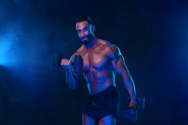 Bodybuilder Neon Colors Athlete Man Posing Black Background Sports Concept Royalty Free Stock Images