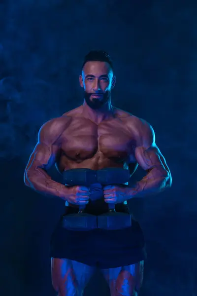 Athlete Bodybuilder Neon Colors Fit Man Posing Black Background Sports Stock Image