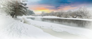 the river in winter during a snowfall clipart