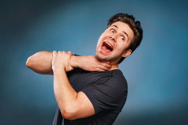 Hand strangles screaming man fun concept