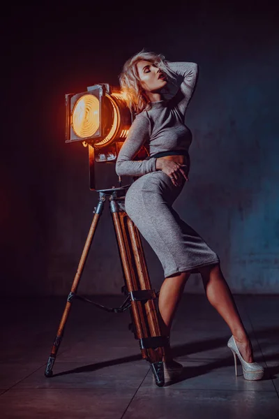 Young Elegant Woman Standing Dark Interior Warm Cinema Light — Stock Photo, Image