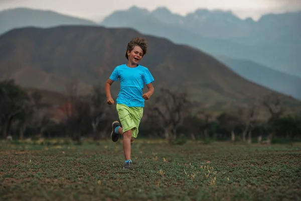 Happy Boy Running Mountains Background — Stock Photo, Image