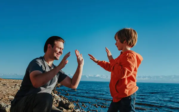 Father Son Playing Hands Lake Summer Day Stock Photo