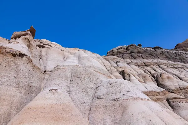 stock image Surreal Badlands Sandstone Formations near Drumheller, Dinosaur capital of the world. Land of hoodoos, multi-hued canyons and geological erosion sculptured by water and wind