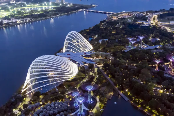 stock image Southeast Asia, Singapore, November, 2022: Aerial view of Singapore city skyline with Gardens by the Bay with evening illumination