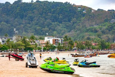 THAILAND, PHUKET, FEBRUARY, 2023: Jet skis boats moored on the Patong beach for the discerning traveler on Phuket Island. Thailand clipart