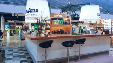 LATVIA, RIGA, AUGUST, 2021 - Modern european small cozy cafe at the shopping mall in Riga, Latvia. clipart