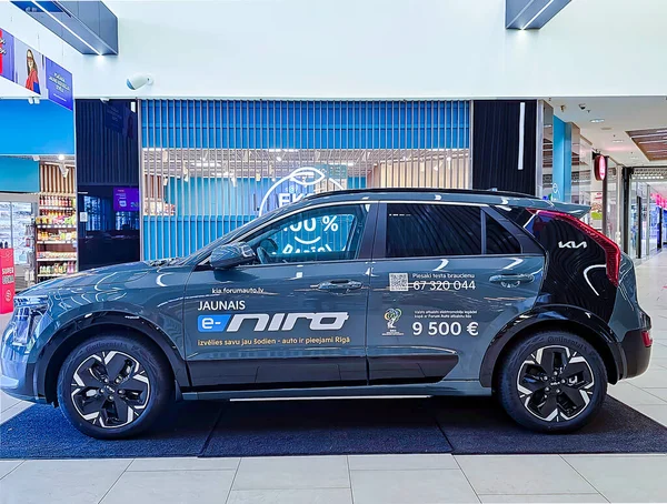 stock image LATVIA, RIGA, 06, SEPTEMBER, 2023: KIA E-NIRO fully electric car reveiled on exhibition and sale in the shopping mall in Riga, Latvia.