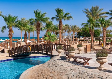 EGYPT, HURGHADA, April 18, 2024: Water river with warm sea water surrounded by beautiful gardens at Steigenberger ALDAU Hotel in Hurghada. Egypt clipart