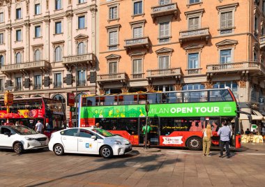 ITALY, MILAN, 25, AUGUST, 2023: Open-top Hop-on Hop-off Milan Open Tour city sightseeing bus in Milan, Italy clipart