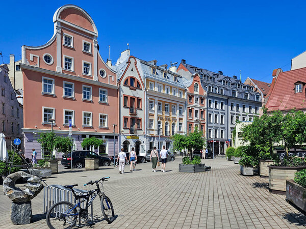 LATVIA, RIGA, 31, MAY, 2024: Beautiful landscaping of the Republic square in Riga Old Town. Latvia. Riga city historical centre is a UNESCO World Heritage Site.