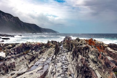 Storms River Mouth and rocky coastline in Tsitsikamma, Garden Route National Park, Eastern Cape. South Africa clipart