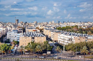 ISRAEL, BAT-YAM, MARCH, 12, 2018: Aerial view of a large residential area in Bat Yam, a suburb of Tel Aviv. Residential buildings with water heaters and solar panels on the roof. Israel.