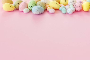 Beautiful Easter card with colorful eggs on paper pink  background