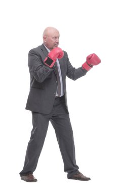 full-length. businessman in Boxing gloves. isolated on a white background.