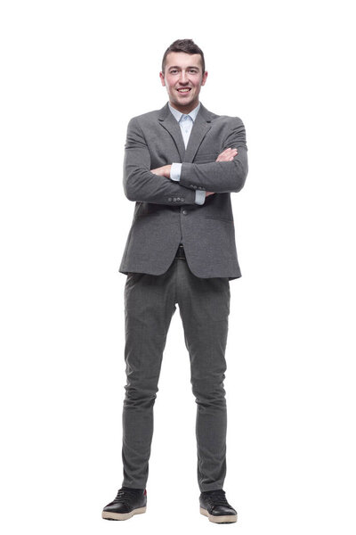 in full growth. a handsome young business man. isolated on a white background.