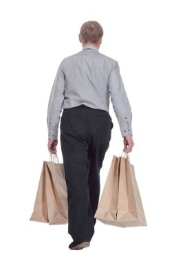 Dikiz aynası. Alışveriş çantalı sıradan bir adam uzaklaşıyor. beyaz arkaplanda izole edilmiş.