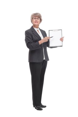 Side view of senior stylish businesswoman writing on clipboard isolated on white background