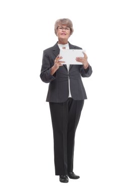 Adult female in black suit holding business papers in her hand, isolated on white background