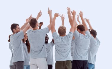 Birlikteliklerini gösteren bir grup genç insan. kopyalama alanı olan fotoğraf