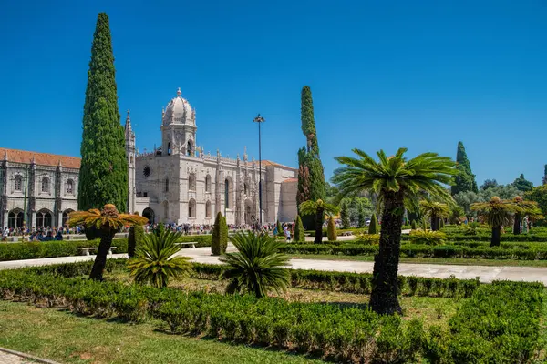 stock image Lisbon, Portugal - JULY 23 , 2024:  The Jeronimos Monastery or Hieronymites Monastery (Mosteiro dos Jeronimos) is a former monastery of the Order of Saint Jerome near the Tagus river in the parish of Belem in Lisbon , Portugal.