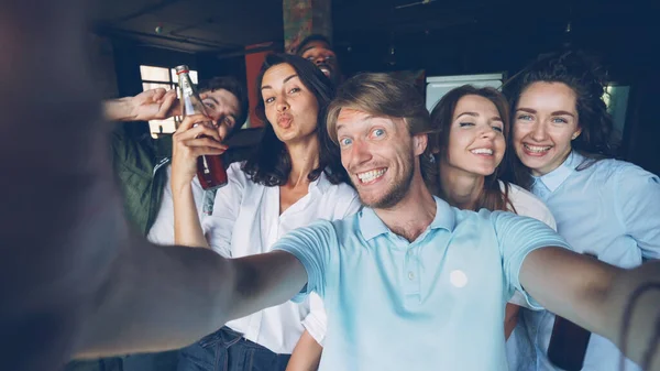Group Happy Colleagues Taking Selfie Together Young Man Holding Camera — Stock Photo, Image