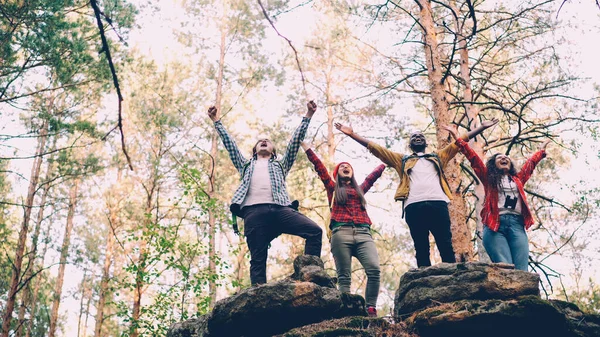 Low Angle View Happy Young People Climbing Mountain Raising Hands — Stock Photo, Image