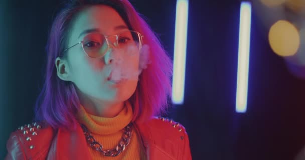 Portrait Pensive Asian Lady Slowly Exhaling Vaping Smoke Enjoying Futuristic — Stock Video