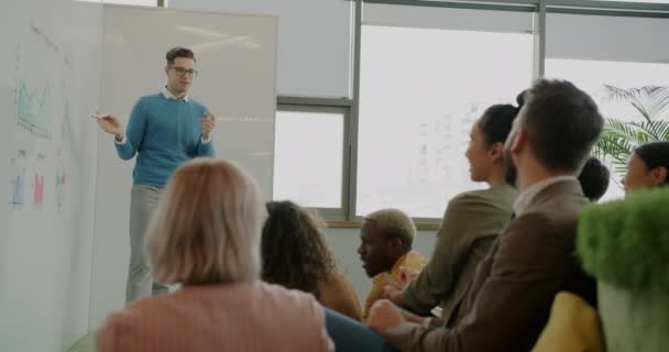 Business Expert Giving Lecture Young People Speaking Pointing Whiteboard Wall — Stock Video