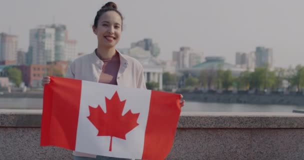 Slow Motion Portrait Pretty Biracial Woman Waving Canadian Flag Standing — Stock Video