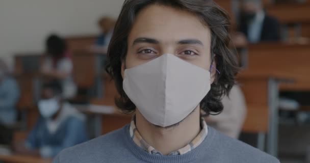 Portrait Middle Eastern Man Wearing Face Mask Standing University Classroom — Stock Video