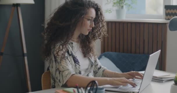 Female Freelancer Working Laptop Computer Typing Concentrated Project Desk Apartment — Wideo stockowe
