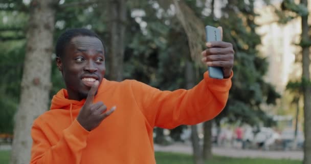 Slow Motion Portrait Joyful African American Man Posing Smartphone Camera — Stock Video