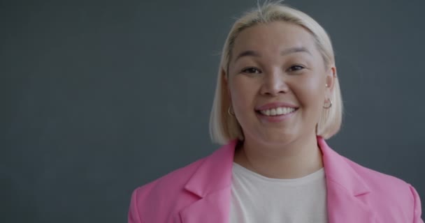 Slow Motion Portrait Ambitious Asian Businesswoman Showing Hand Gesture Smiling — Stock Video