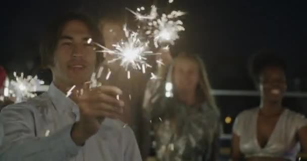 Joyful Asian Guy Dancing Burning Bengal Lights Relaxing Rooftop Party — Stock Video