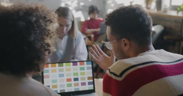 Creative Designers Working Laptop Talking Sharing Ideas Indoors Modern Cafe — Stock Video