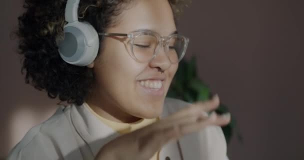 Close Joyful African American Woman Wearing Wireless Headphones Listening Music — Stock Video