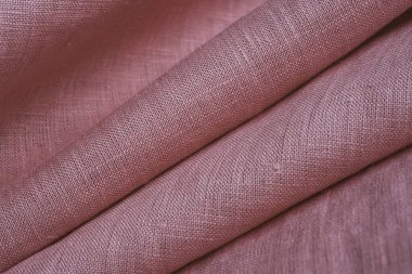 Kırışık keten bezler katlanmış peçeteler. Doğal keten kumaş dokusu. Kumaş kaplama. Doğal çevre dostu malzemeler kullanma kavramı