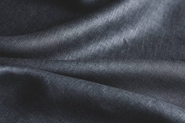 Kırışık keten bezler katlanmış peçeteler. Doğal keten kumaş dokusu. Kumaş kaplama. Doğal çevre dostu malzemeler kullanma kavramı