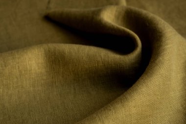 Kırışık keten bezler katlanmış peçeteler. Doğal keten kumaş dokusu. Kumaş kaplama. Doğal çevre dostu malzemeler kullanma kavramı