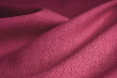 Kırışık keten bezler katlanmış peçeteler. Doğal keten kumaş dokusu. Kumaş kaplama. Doğal çevre dostu malzemeler kullanma kavramı