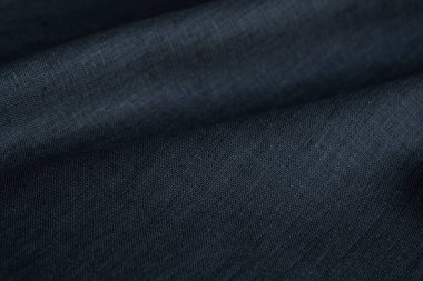 Kırışık keten bezler katlanmış peçeteler. Doğal keten kumaş dokusu. Kumaş kaplama. Doğal çevre dostu malzemeler kullanma kavramı