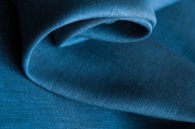 Kırışık keten bezler katlanmış peçeteler. Doğal keten kumaş dokusu. Kumaş kaplama. Doğal çevre dostu malzemeler kullanma kavramı