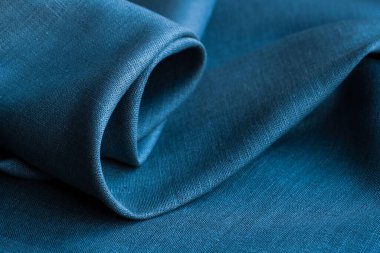 Kırışık keten bezler katlanmış peçeteler. Doğal keten kumaş dokusu. Kumaş kaplama. Doğal çevre dostu malzemeler kullanma kavramı