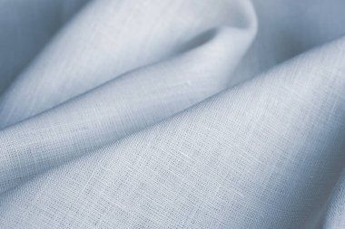 Kırışık keten bezler katlanmış peçeteler. Doğal keten kumaş dokusu. Kumaş kaplama. Doğal çevre dostu malzemeler kullanma kavramı