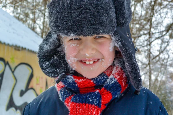 Happy smiling boy outdoor in winter. Winter fun activity outdoor, Winter vacation. Family time